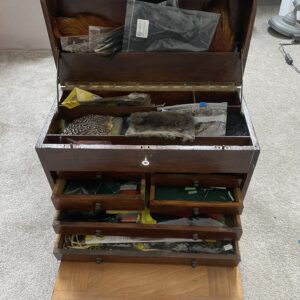 Fly tying tool case with lots of various fly tying material